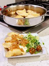 potato and cheese pierogi cooking