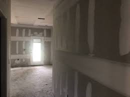 Should Drywall Touch The Floor Best