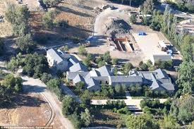 Celebrity power couple kim kardashian west and kanye west have expanded their real estate portfolio in the hidden hills gated community of their newest property is split, with the main house on one side of the street and an equestrian setup on the other. Renovations At Kim Kardashian And Kanye West S Mansion Grind To Halt Daily Mail Online