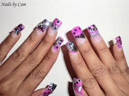 pink and black rockstar nails by