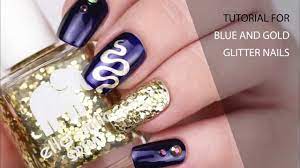 blue and gold glitter nails you