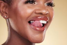 tongue out makeup and black woman smile