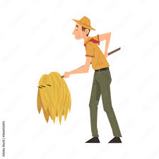 male zoo worker carrying hay with