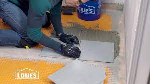 how to tile a bathroom floor you