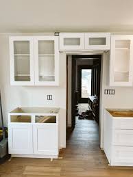 install and connect kitchen cabinets