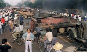The tanks tried to go around the man, but he stepped back into their path, climbing atop one briefly. Thirty Years On The Tiananmen Square Image That Shocked The World Tiananmen Square Protests 1989 The Guardian