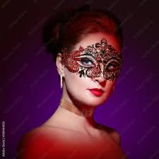 red lips golden mask stock photo