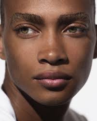 12 black male supermodels with green