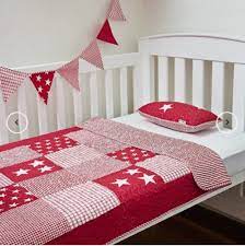 white cot bed crib quilt baby
