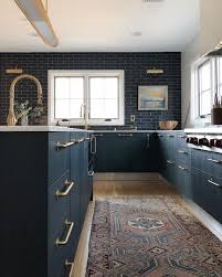 dark kitchen cabinets with light floors