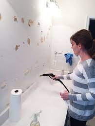 remove a large bathroom builder mirror