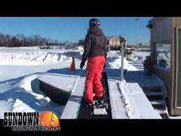 how to ride a ski carpet snowboarder