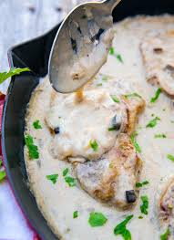 These baked boneless pork chops with cream of mushroom soup are smothered in sauce and deliciously tender. Baked Pork Chops With Cream Of Mushroom Soup The Kitchen Magpie