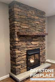 stone fireplace with barn wood mantel