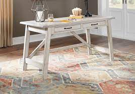 This functional wooden desk table brings a new element of style to any office or home and creates the perfect space to be productive and inspired. Carynhurst Whitewash Desk Lexington Overstock Warehouse