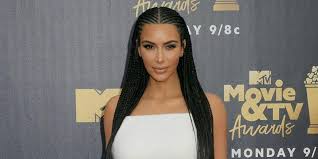 kim kardashian promotes makeup collab