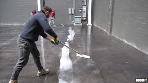 black concrete stain application with
