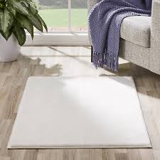 rabbit faux fur solid ivory accent rug