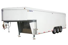 A heavy duty spring assisted rear ramp provides entry and exit of the trailer. Gooseneck Enclosed Cargo Trailers