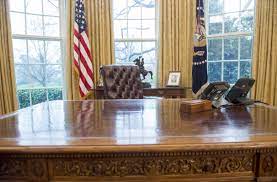 Though the resolute desk has resided in the white house from the time it was given to hayes, it didn't begin its stint as an oval office feature until the kennedy administration. Donald Trump S Addition To The Oval Office Is A Button For Ordering A Coke Architectural Digest