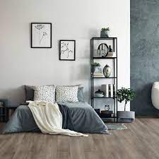 Quality brands of laminate flooring could easily pass for more expensive exotic woods like teak or bamboo. Liberty Floors Comfort 12mm Dark Oak Grey Laminate Flooring 52505 Leader Floors