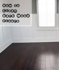 how to clean dark wood floors sunlit