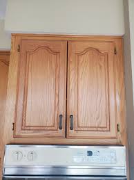 how to clean kitchen cabinets before