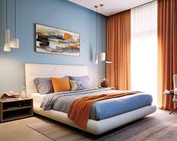 a bedroom with blue walls white carpet