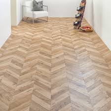 Click&collect or fast home delivery. Liberty Floors Chevron Parquet 8mm Natural Oak Embossed Laminate Flooring 8192 Leader Floors