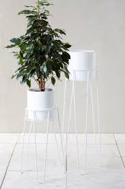 Plant pots can be made of several different materials. Buy Set Of 2 Tall Lightweight Metal Planters From The Next Uk Online Shop Plant Stand White Plants Indoor Plant Pots
