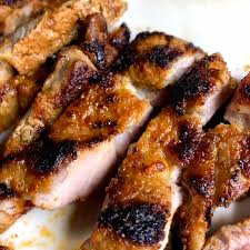 smoky grilled bbq pork shoulder steaks
