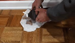black urine stains from hardwood floors