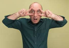 Free Photo | Surprised middle-aged man wearing green t-shirt showing peace  gesture isolated on olive green wall