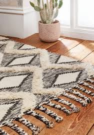 mandor diamond tufted rug with braided