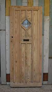 Pine Cottage Door With Bullseye Glass