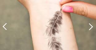 17 unique arm tattoo designs for girls feder tattoo oberarm. Star One Tatto Am Arm Alles Federn