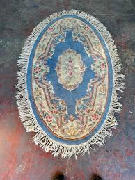 vine woollen chinese oval blue rug