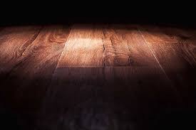 fix wood floor popping up a