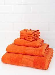 We stock bath towels online in various sizes, styles and colours. Essential Studio Bright Orange Pure Cotton Towel Range Orange Towels Cotton Towels Bright Orange