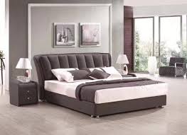 a a modern fancy wooden double bed with