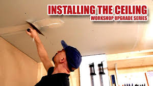 installing a plasterboard ceiling by