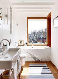 Give the ceiling a lift with this budget bathroom idea by covering it in beadboard and extending it down the walls several inches for a canopy effect. Bathroom Inspiration 20 Beautiful Bathroom Ideas Uk