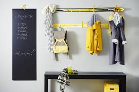 Hold the tape measure at the desired height from step 2 and make two small vertical marks on the wall using a pencil for the hold up the coat rack, and align the mounting holes with the drywall anchors. Diy Upcycled Furniture Ideas Reusing Skis And Snowboard