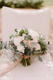 wedding bouquet with white peonies for