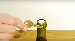 Open it with your shoe (source: How To Open A Wine Bottle Without A Corkscrew Simplemost