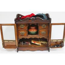 an edwardian smokers cabinet and