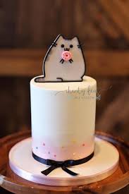 Piece of birthday cake with candle on table. Cute And Simplistic Charity Fent Cake Design Pusheen The Cat Cake