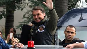 Brazil's president jair bolsonaro led thousands of motorcyclist supporters through the streets of sao paulo on saturday — and got hit with a fine for failure to wear a mask in violation of local pandemic restrictions. Prvrmebhbwz66m