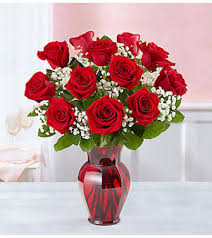 red roses one dozen in red vase send