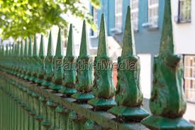 Wrought Iron Fence With Spikes Stock